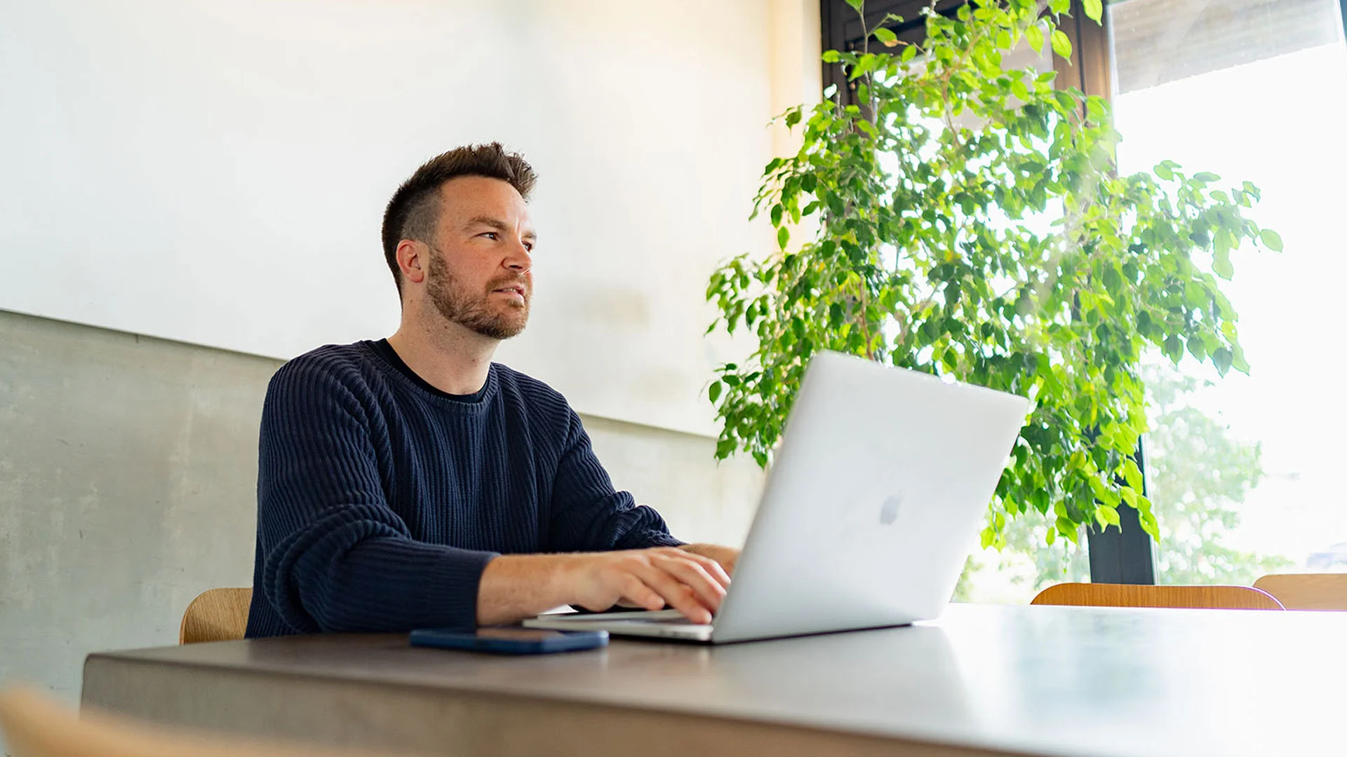 Man reading his credit rating online.