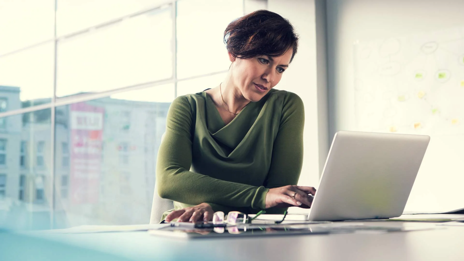 Manager reading employee's return to work letter.