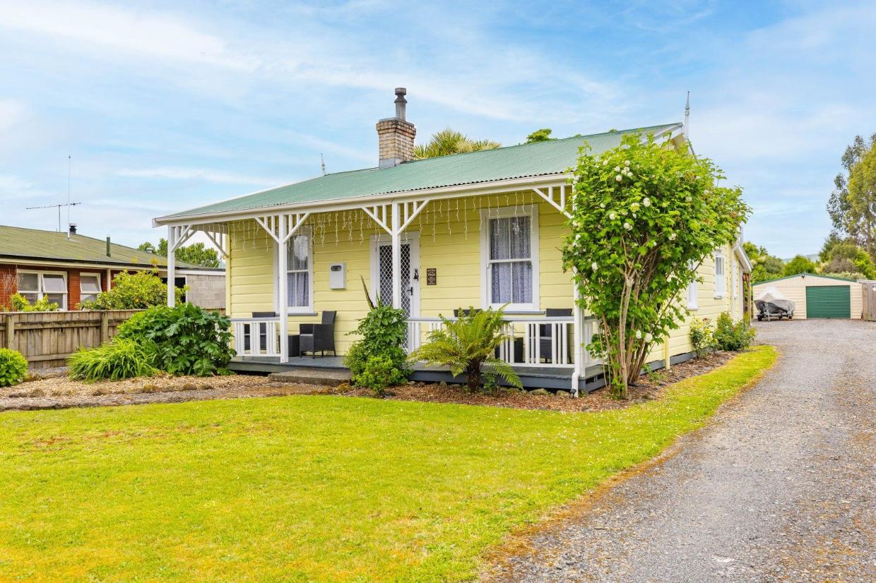 This little cottage could be yours for less than $500k... and it's not the only dwelling on the property.