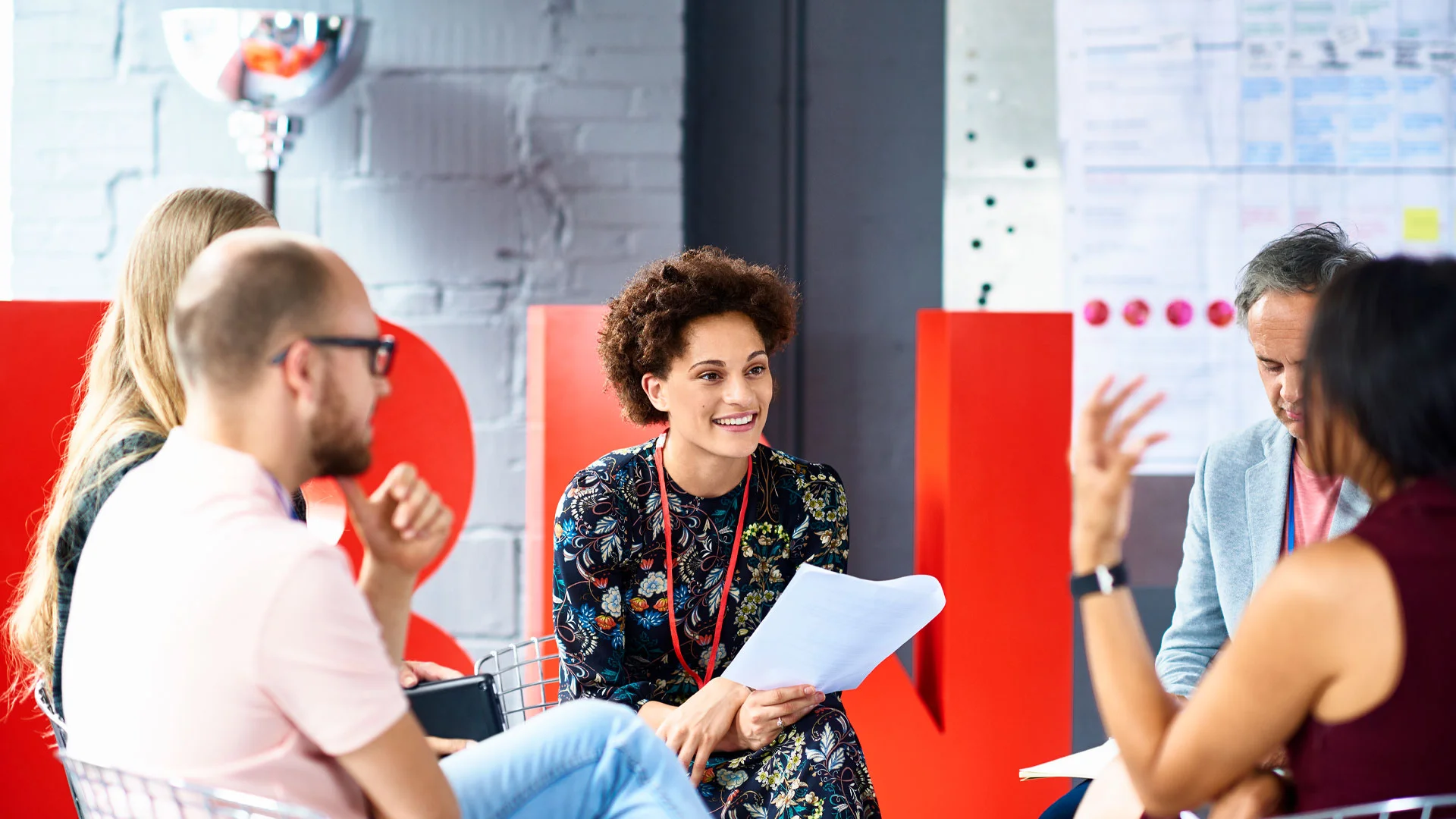 New starter in a meeting with their new colleagues.