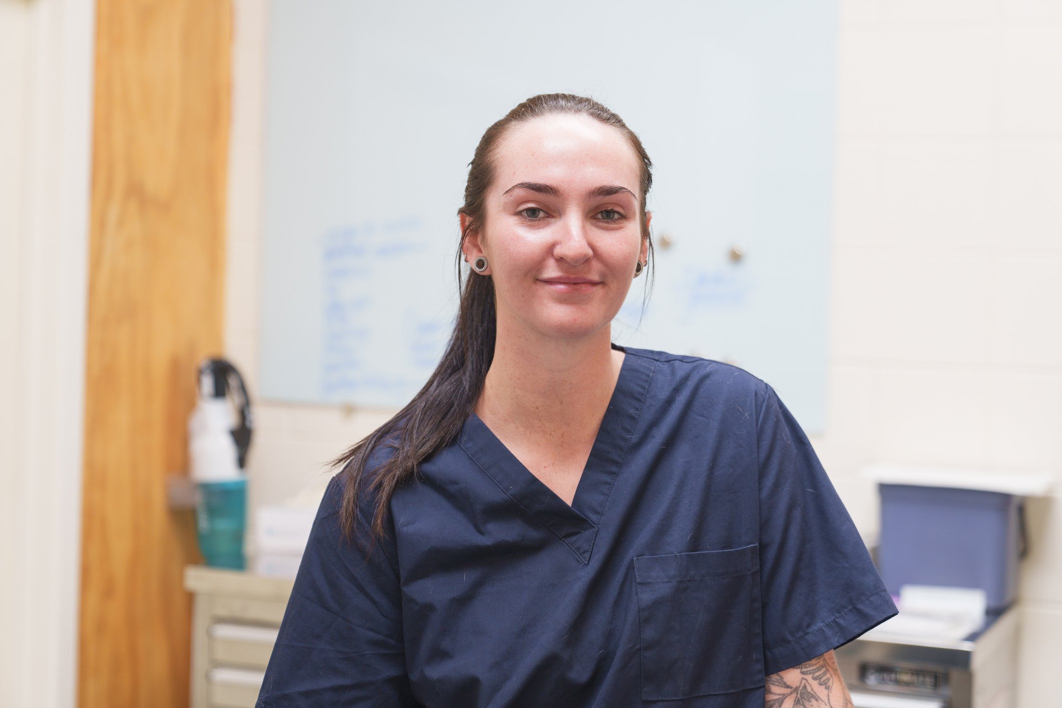 Female vet nurse standing in clinic room