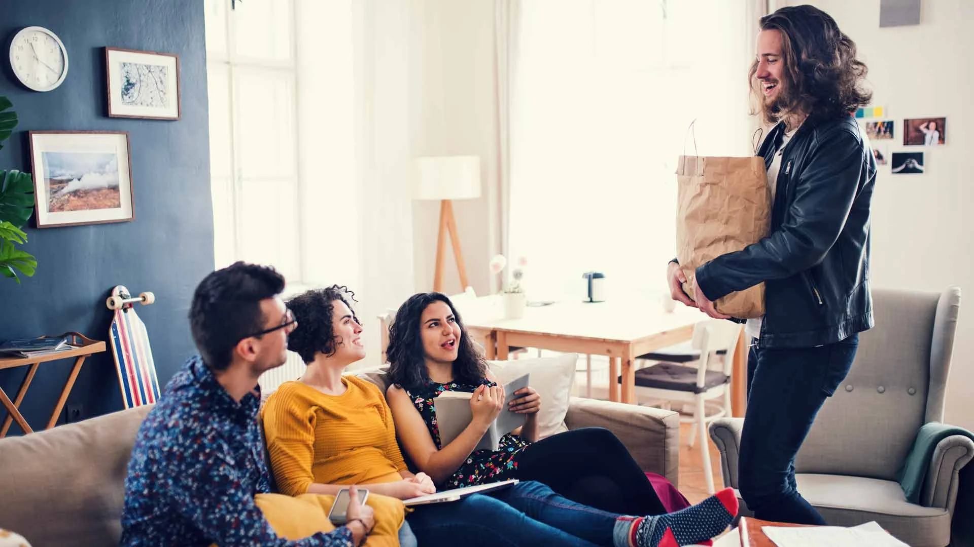 Flatmates ordering takeaway together.