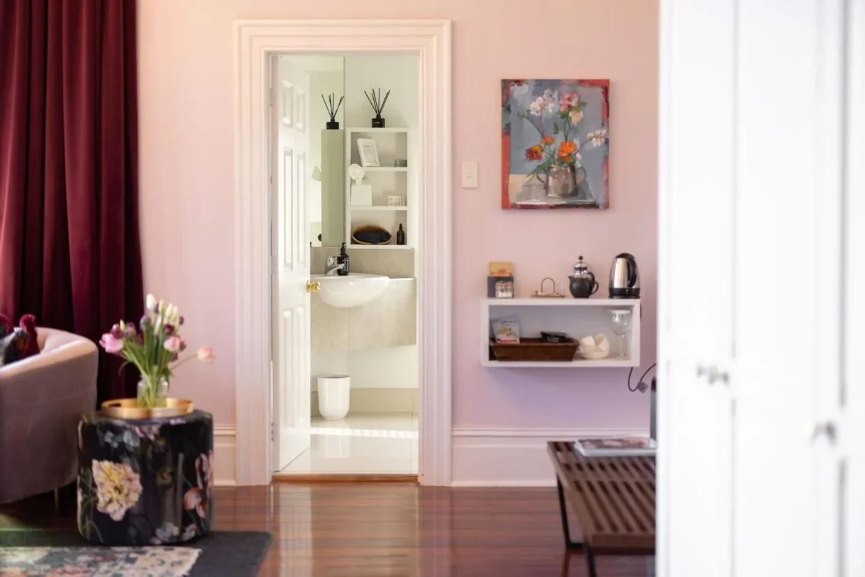 Polished native timber flooring features throughout.