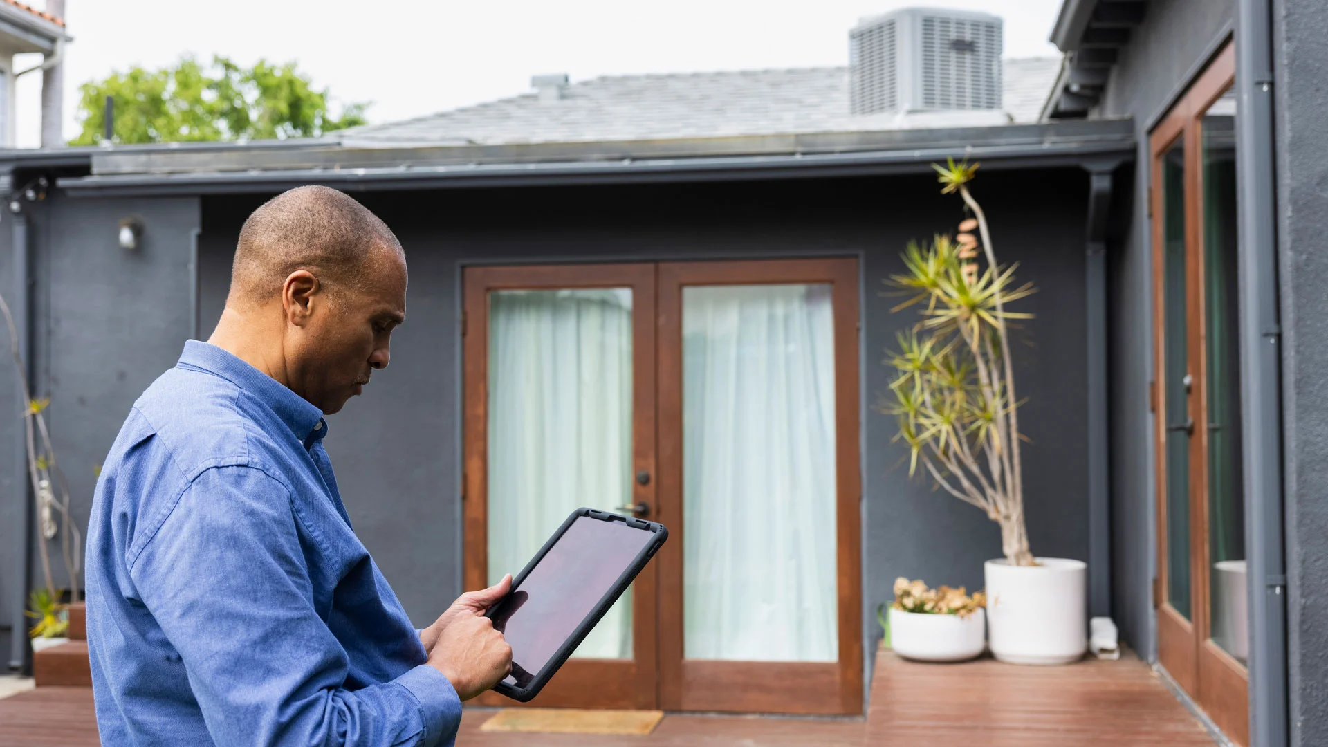 A building inspector doing an inspection on a property for sale in New Zealand.