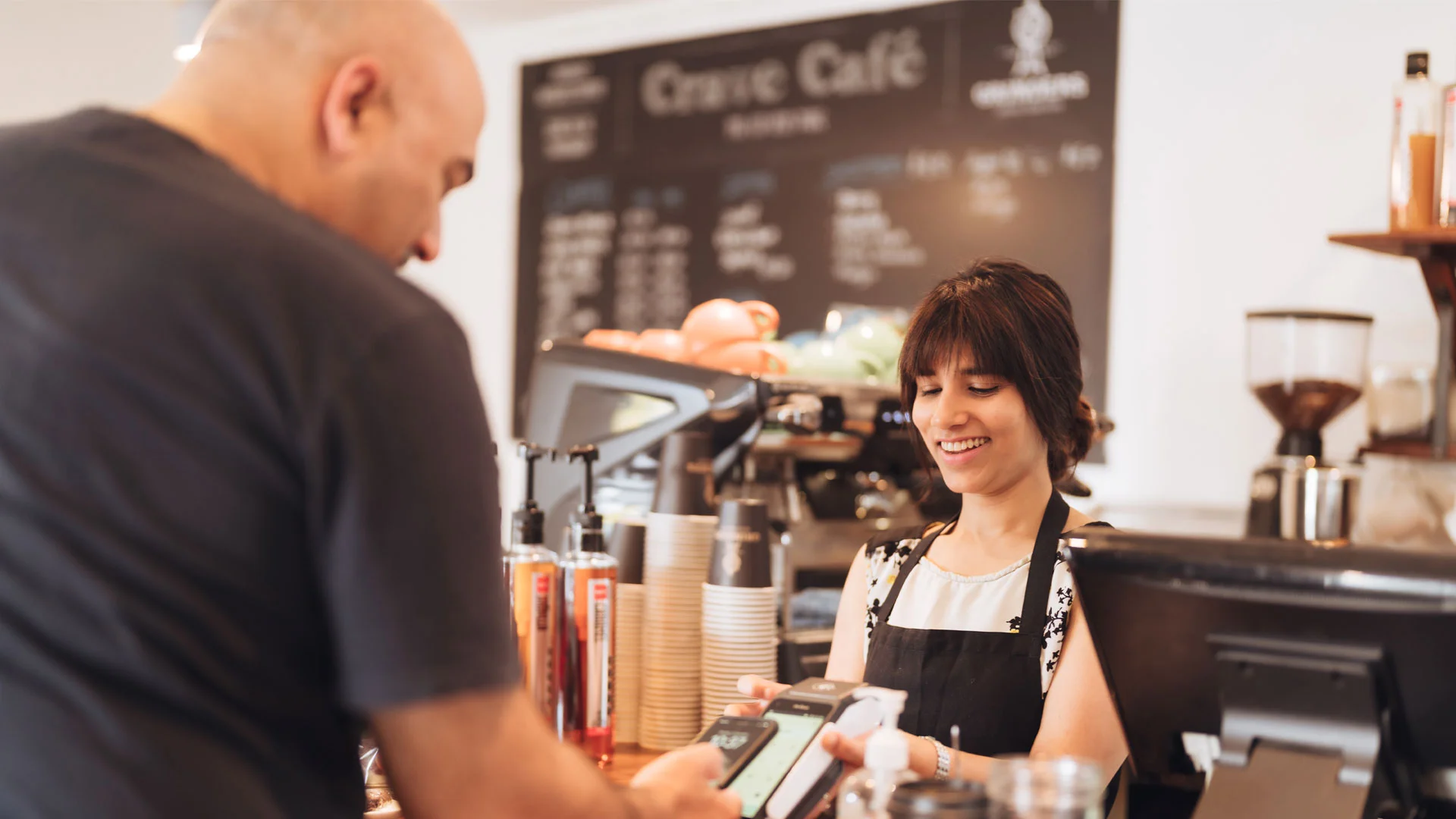 Woman working a seasonal hospitality job in New Zealand.