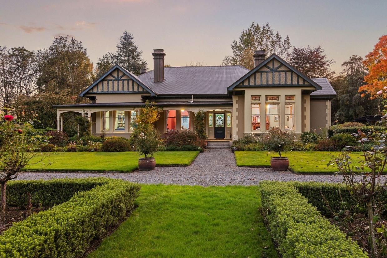 “Getting away from it all” turned out to be a great decision for Rosemary and John Shirtcliff, who bought Raukapuka Homestead 23 years ago. Photo: NZ Sotheby's