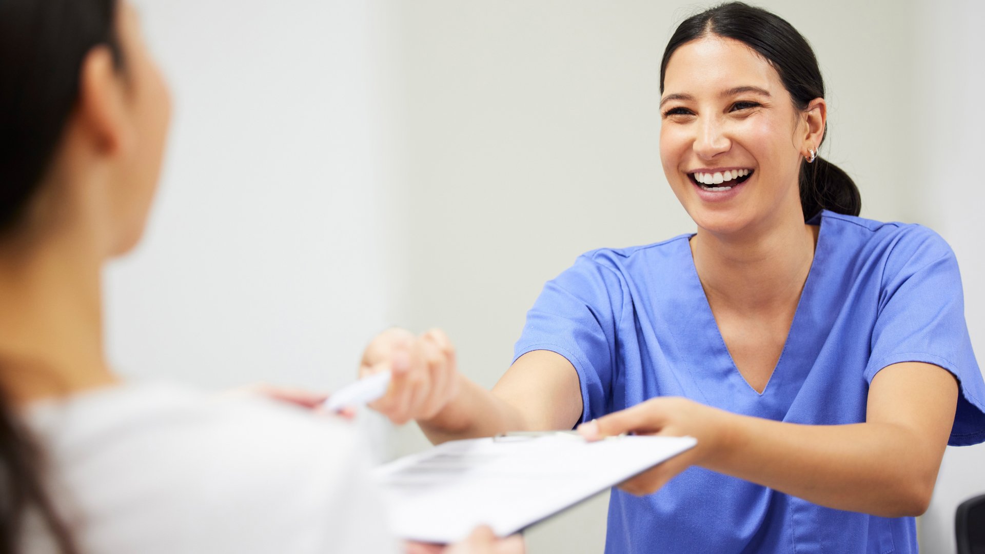 Nurse interacting with a patient