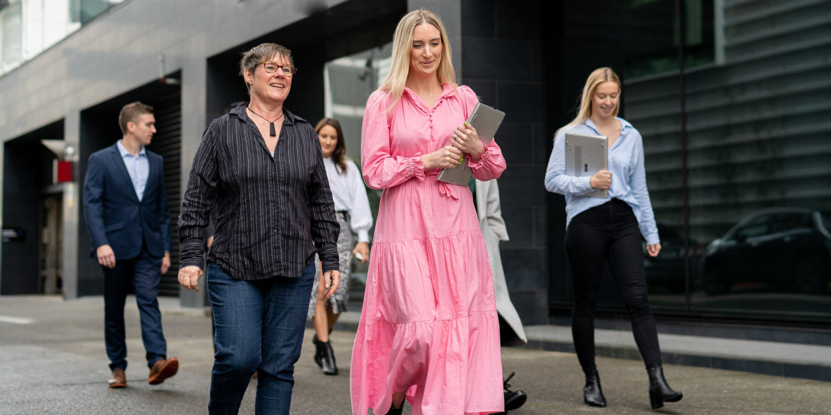 A trophy being held in the air.