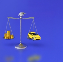 Scales with coins and a car