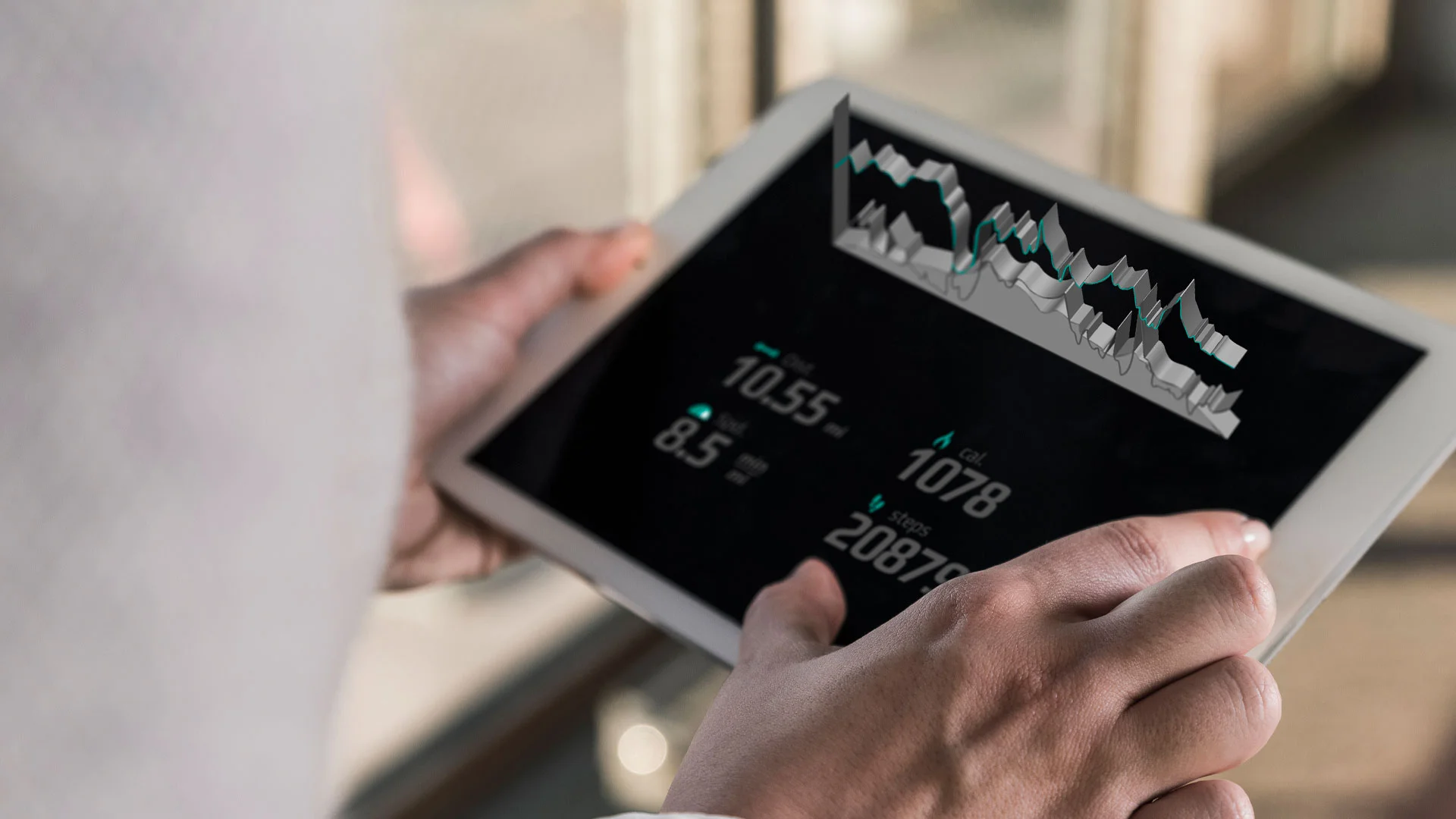 Sports data analyst holding a digital tablet and looking at the results of a test.