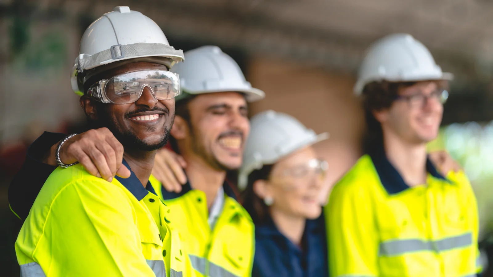 Staff hanging out in high vis vests