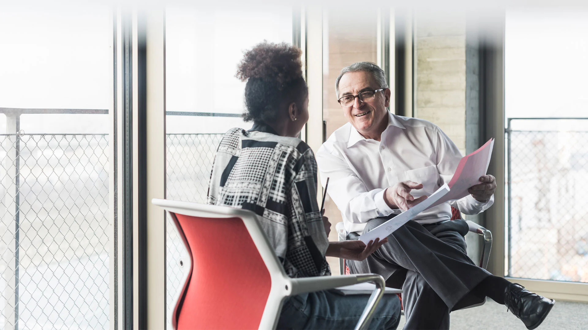 Employee learning how her salary is calculated.