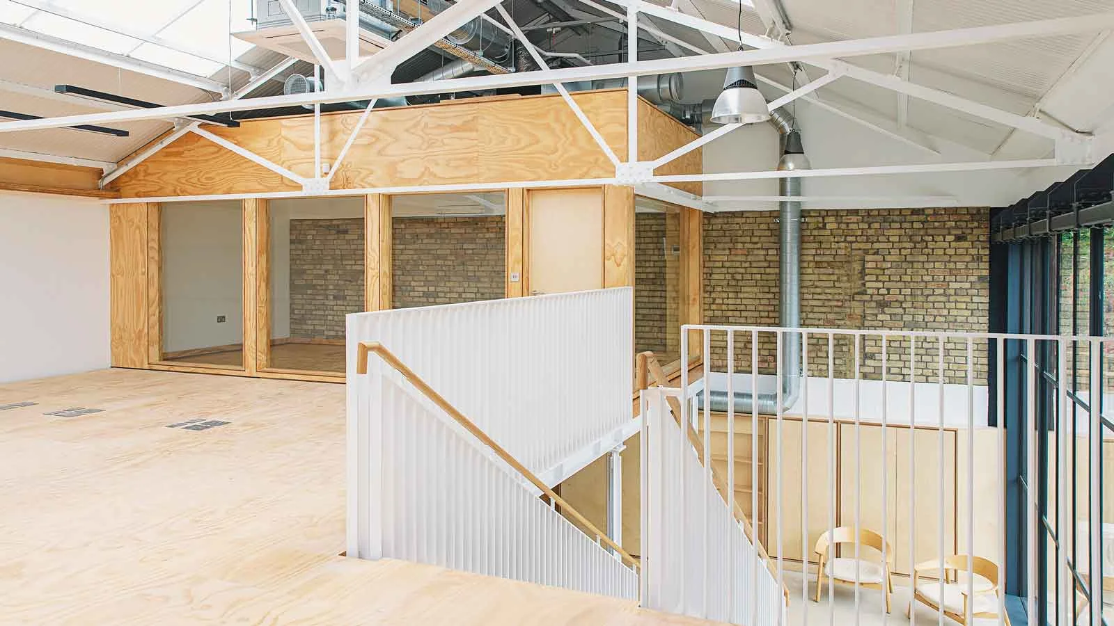 Laptop and mobile device showing Trade Me Property web features.