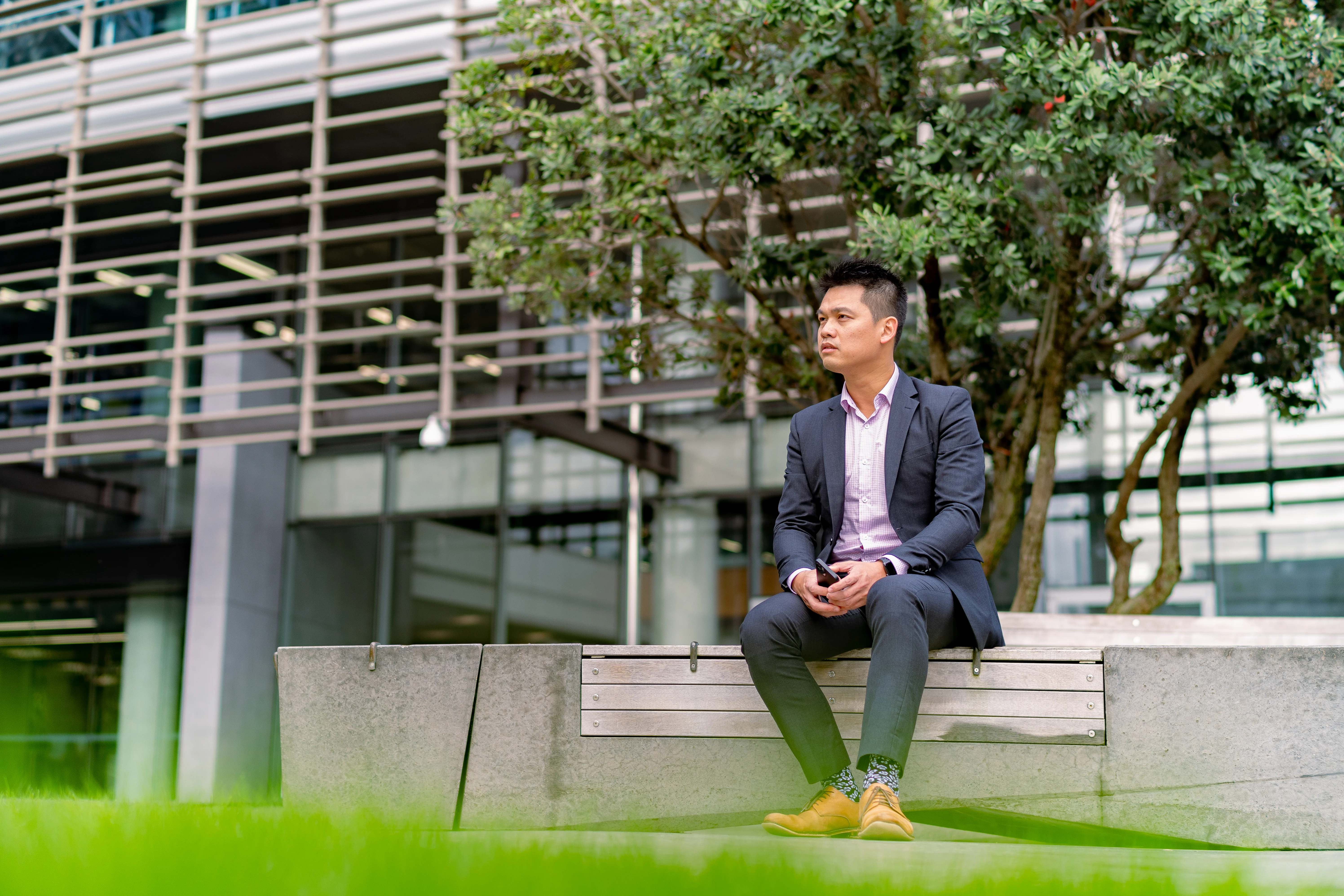Two women shaking hands in meeting.