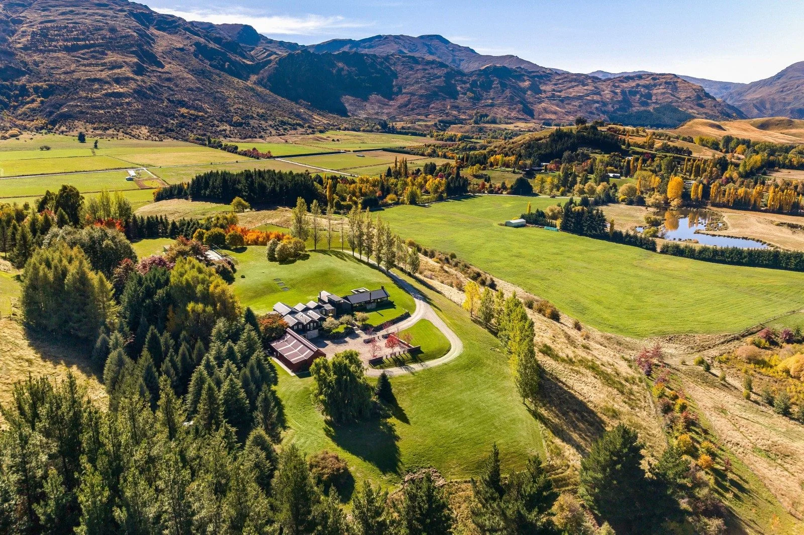 Expansive luxury estate on Hunter Road in Queenstown, one of New Zealand’s most expensive houses, set on rolling farmland with panoramic mountain views.