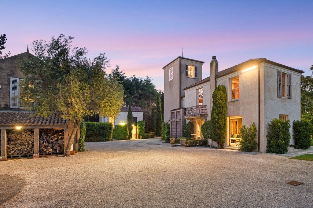 This Waimauku country sanctuary has 20 acres of grounds and native landscaping. Photo: Sothebys International Realty