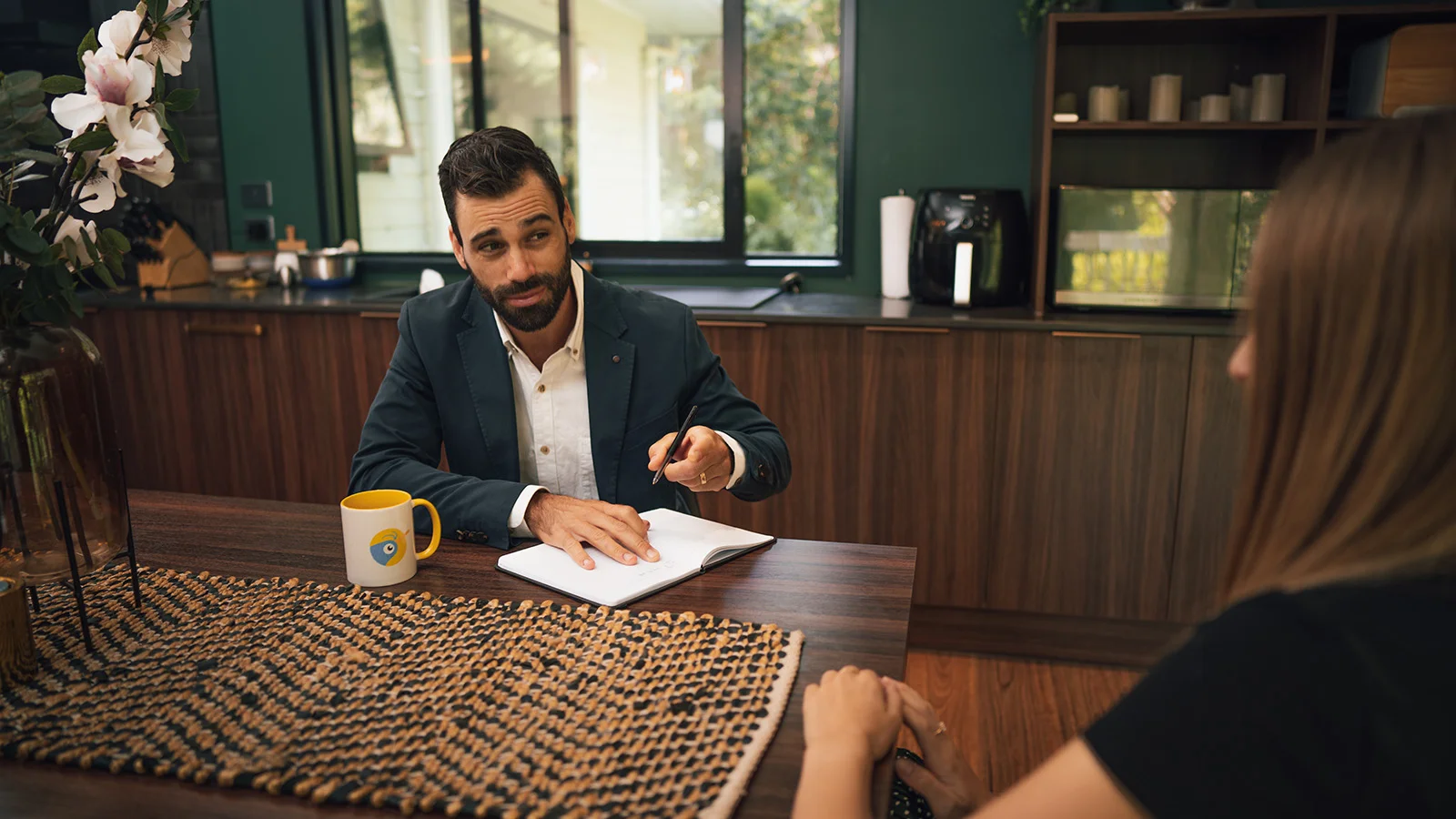 A property valuer in NZ working out what a home is worth.