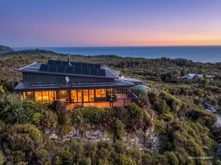 Off-grid home with "wow" views on the West Coast. Photo: TRADE ME/Arizto