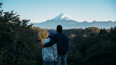 Couple looking at Mt Taranaki