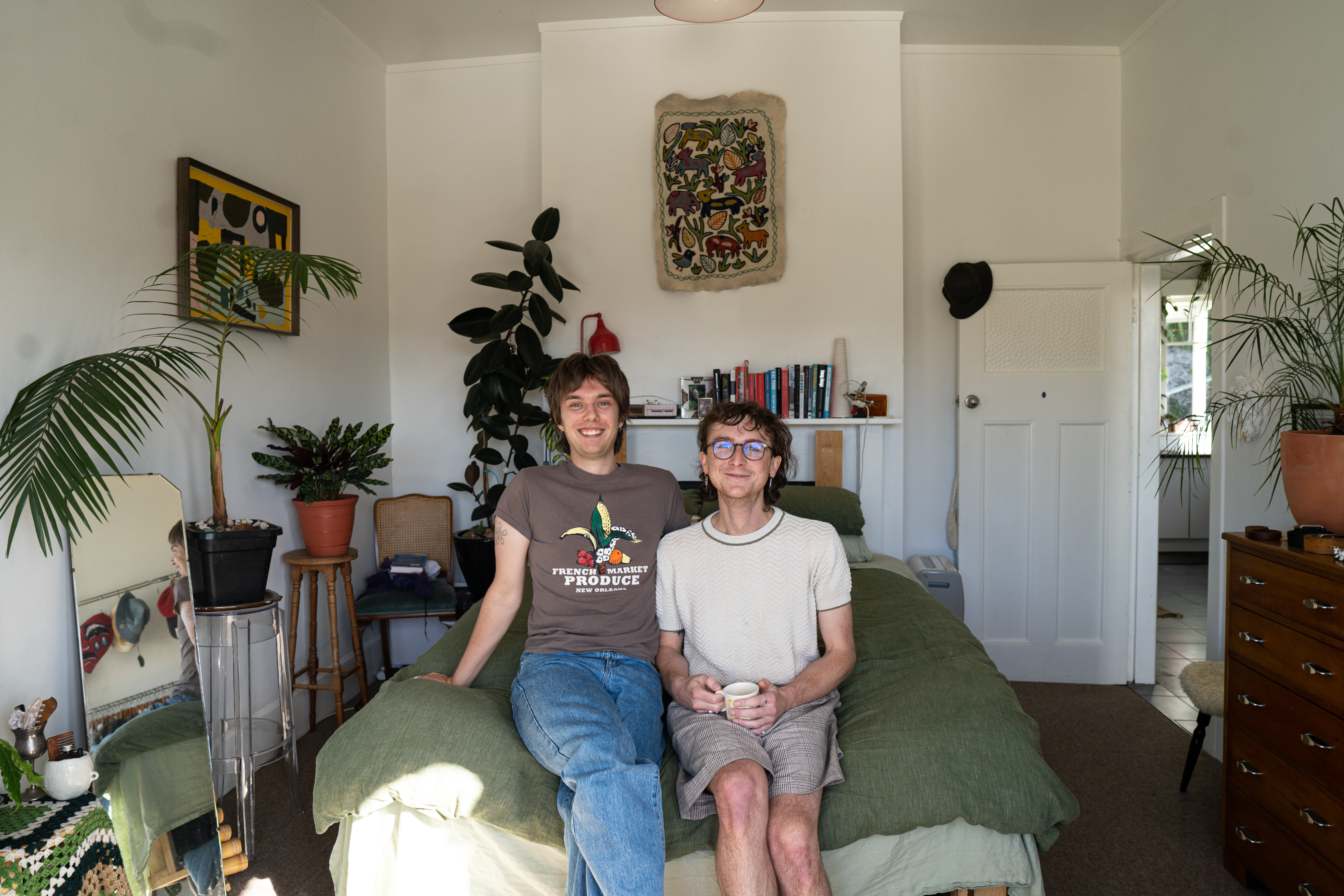 Andie and Atom in their sunny bedroom.