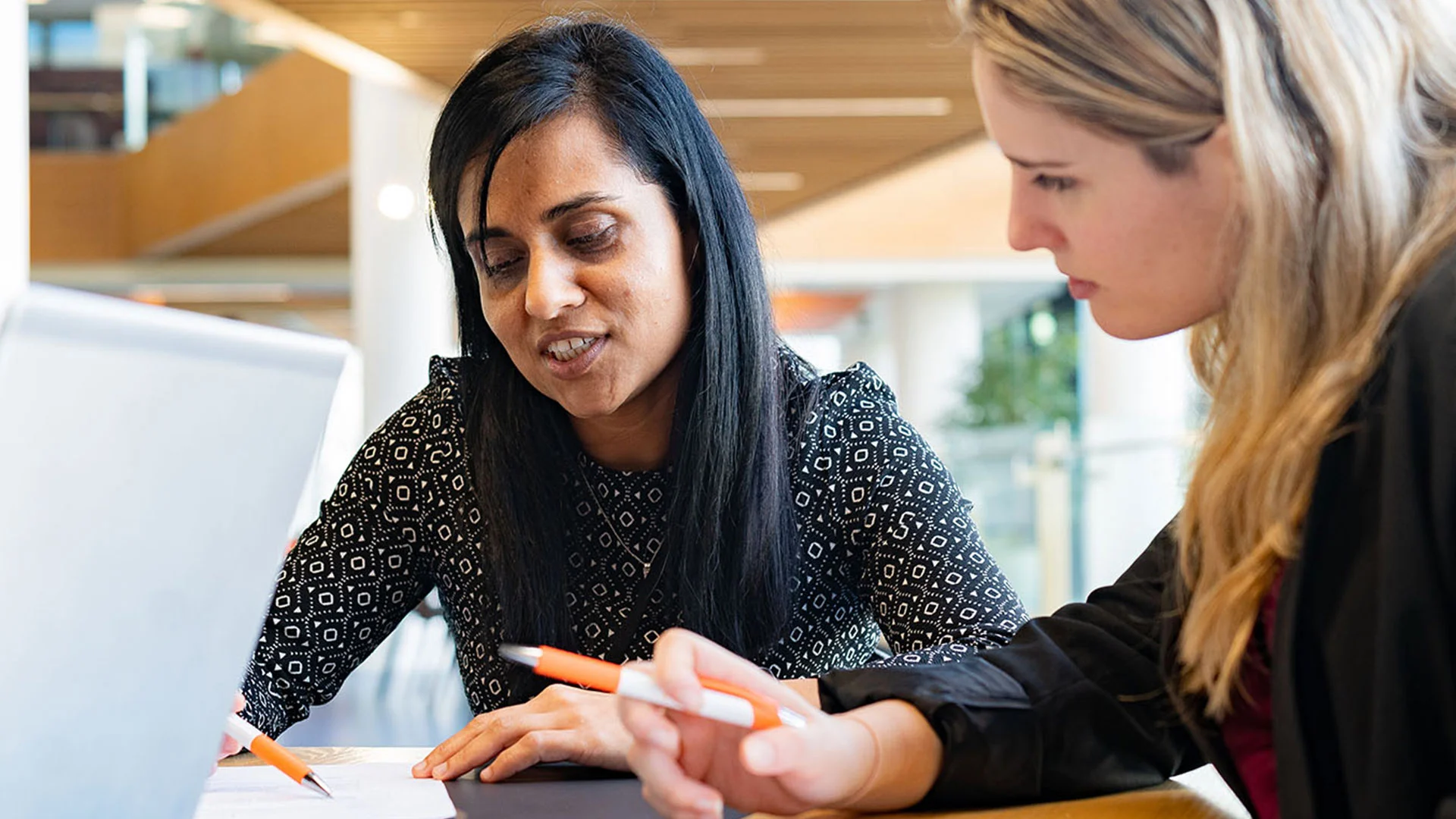 Employee discussing flexible working arrangements with her manager.
