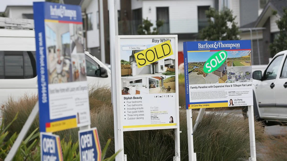 Sold signs for homes sold by auction