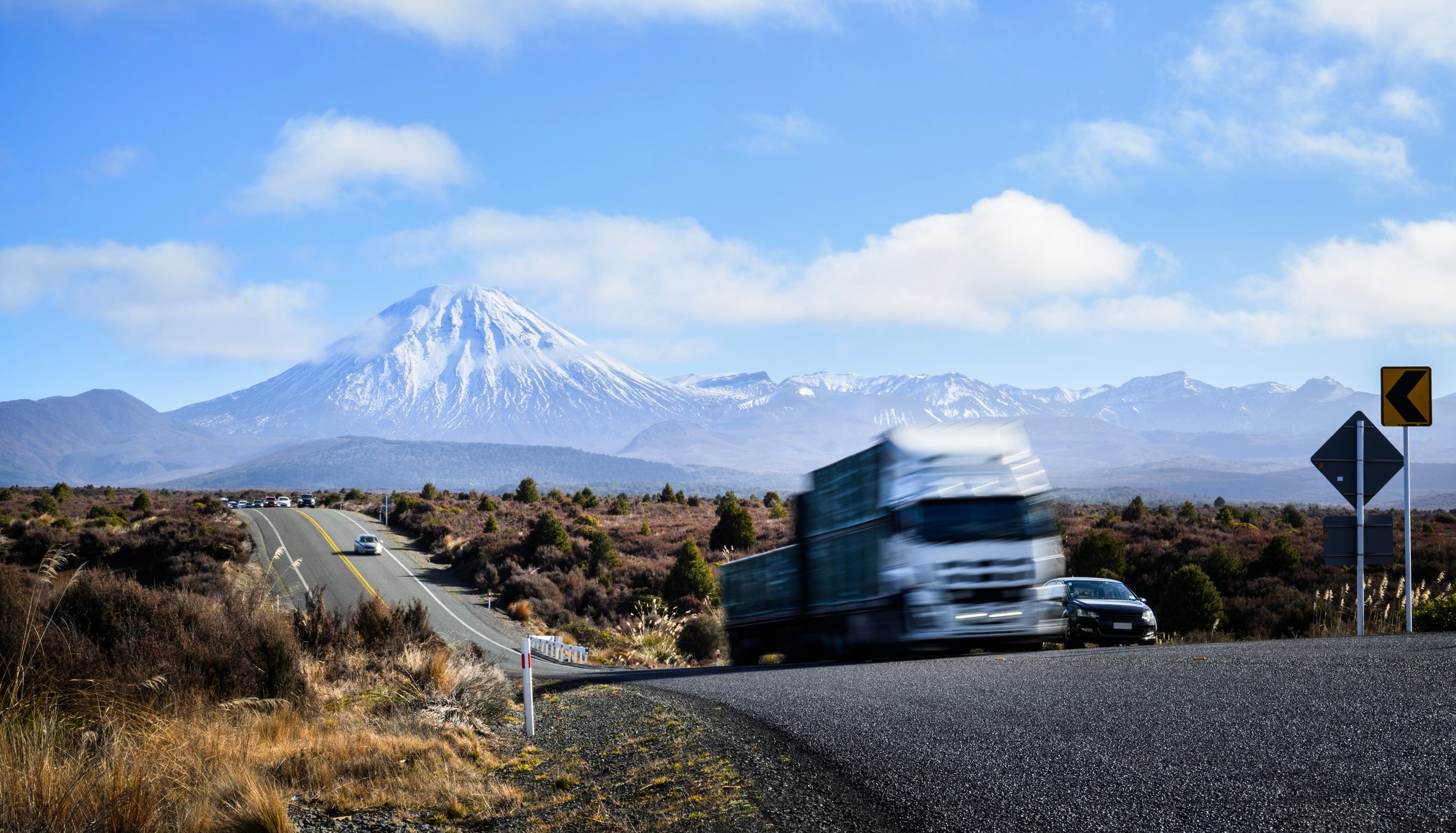 Traffic on Desert Road. Mt Ngauruhoe in the distance. 