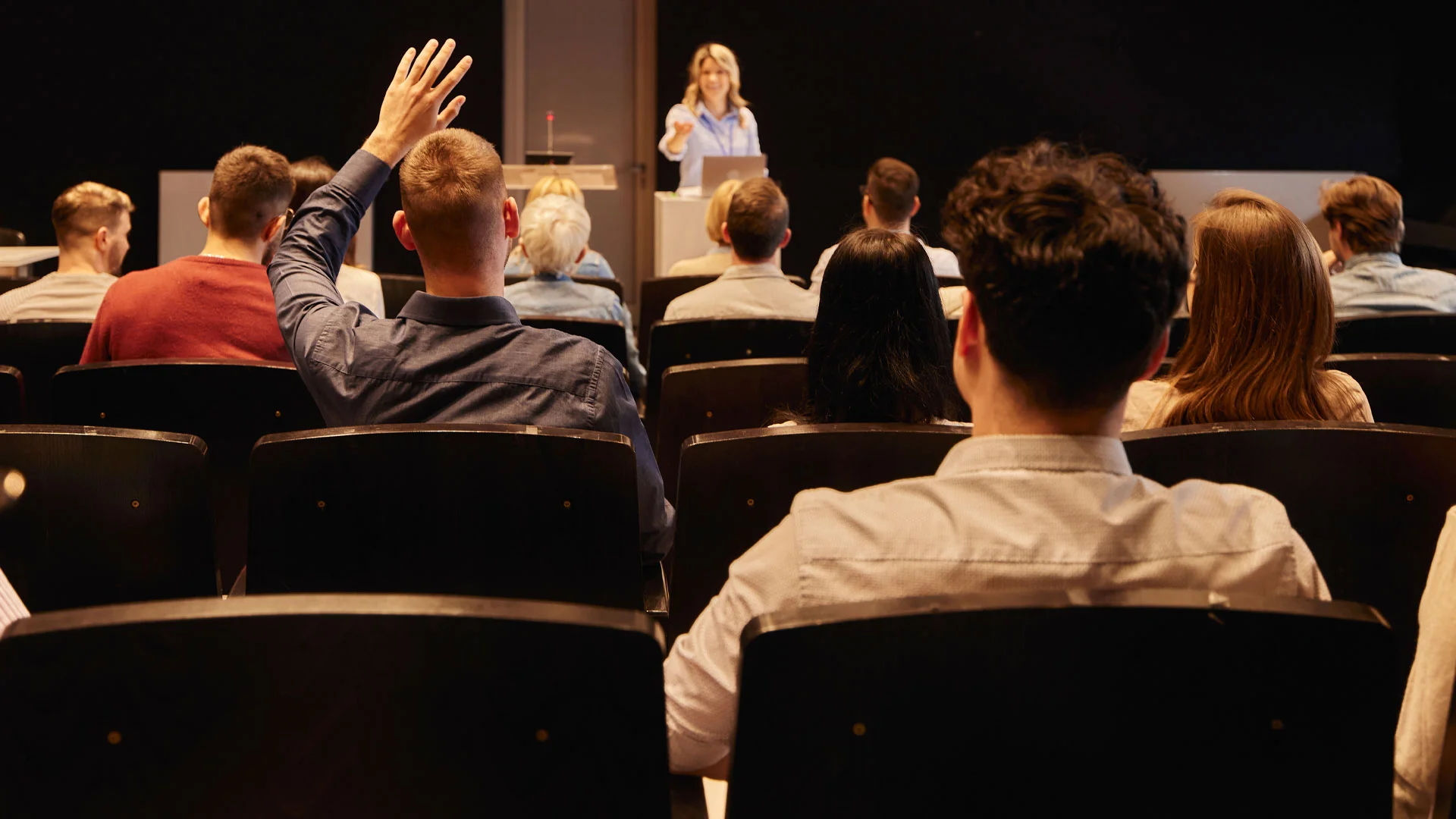 Kiwi bidding on a home at a property auction in NZ.
