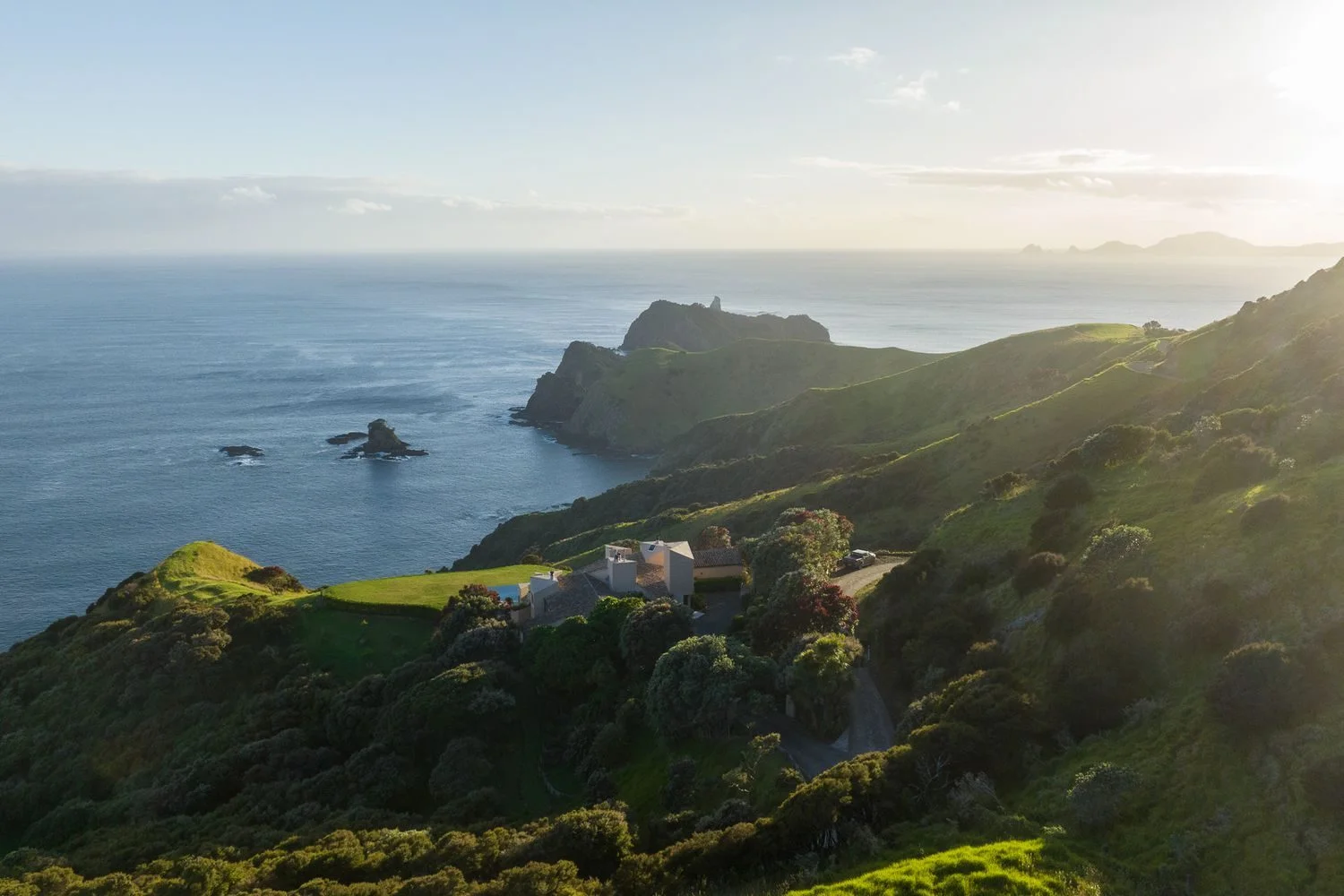 Drone shot of the house and the clifftop views over the ocean