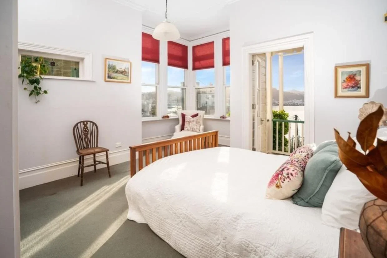 Bedroom with French doors to veranda