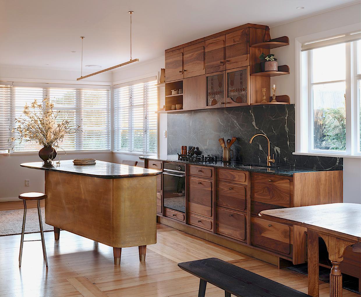 Beautiful timbers and brass define this new kitchen by Atelier Jones, which is the 2026 TIDA NZ Architectural Designer Kitchen of the Year. Photo: David Straight