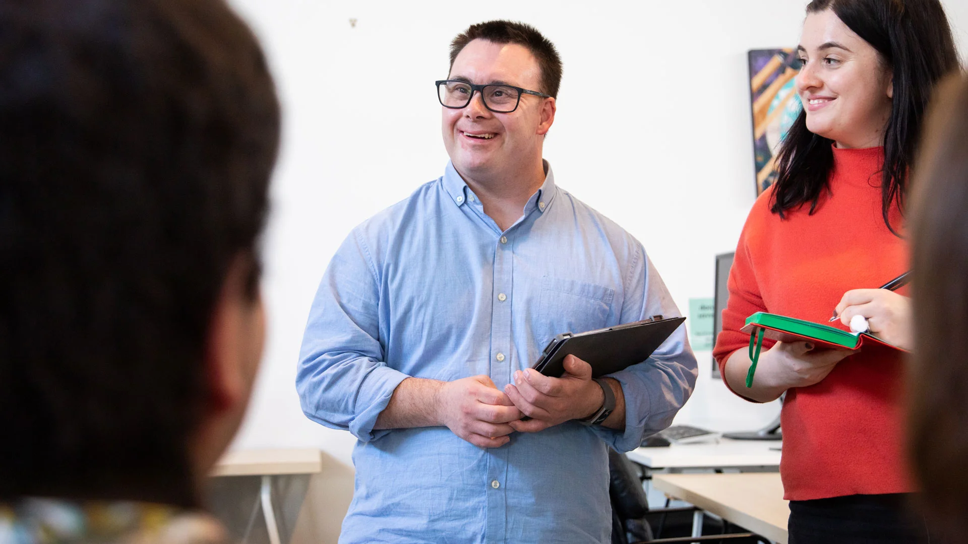 Young officeworker giving in a presentation.