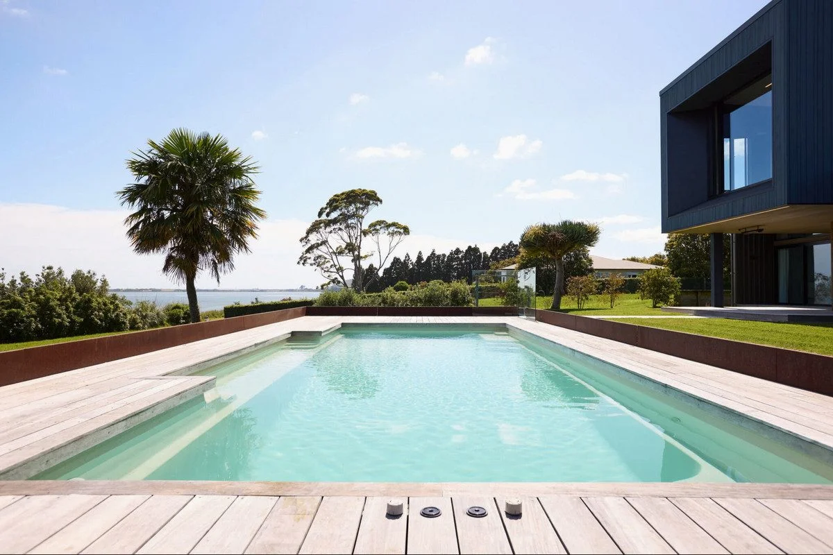 Exterior of home with large pool
