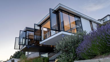 Full-height glazing opens up the two wings of this Queenstown house designed by structural engineer Warrick Weber.