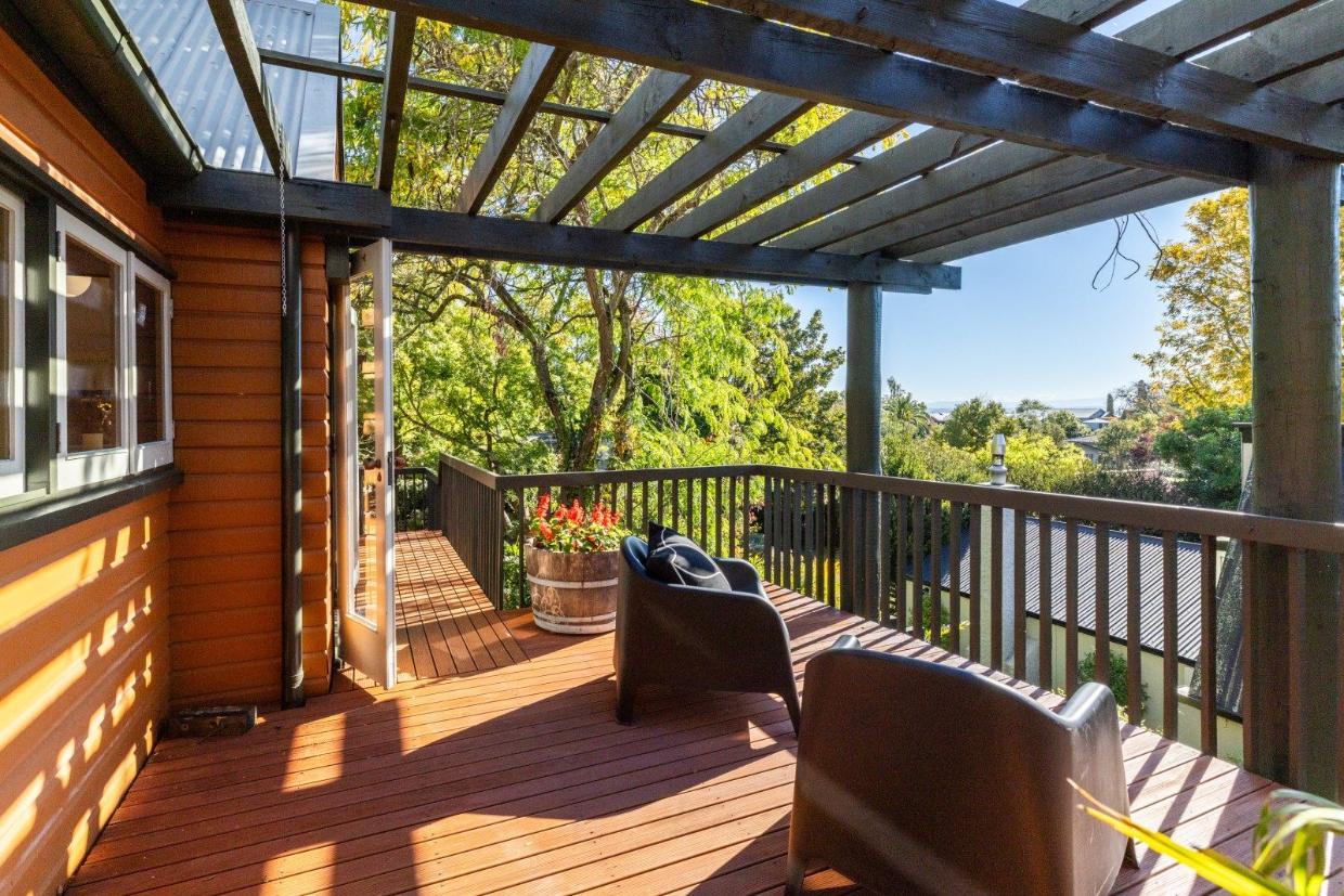 Nestled among the trees in Havelock North’s dress circle is a family home designed by a well-known Hawke’s Bay architect. Photo: Sotheby's