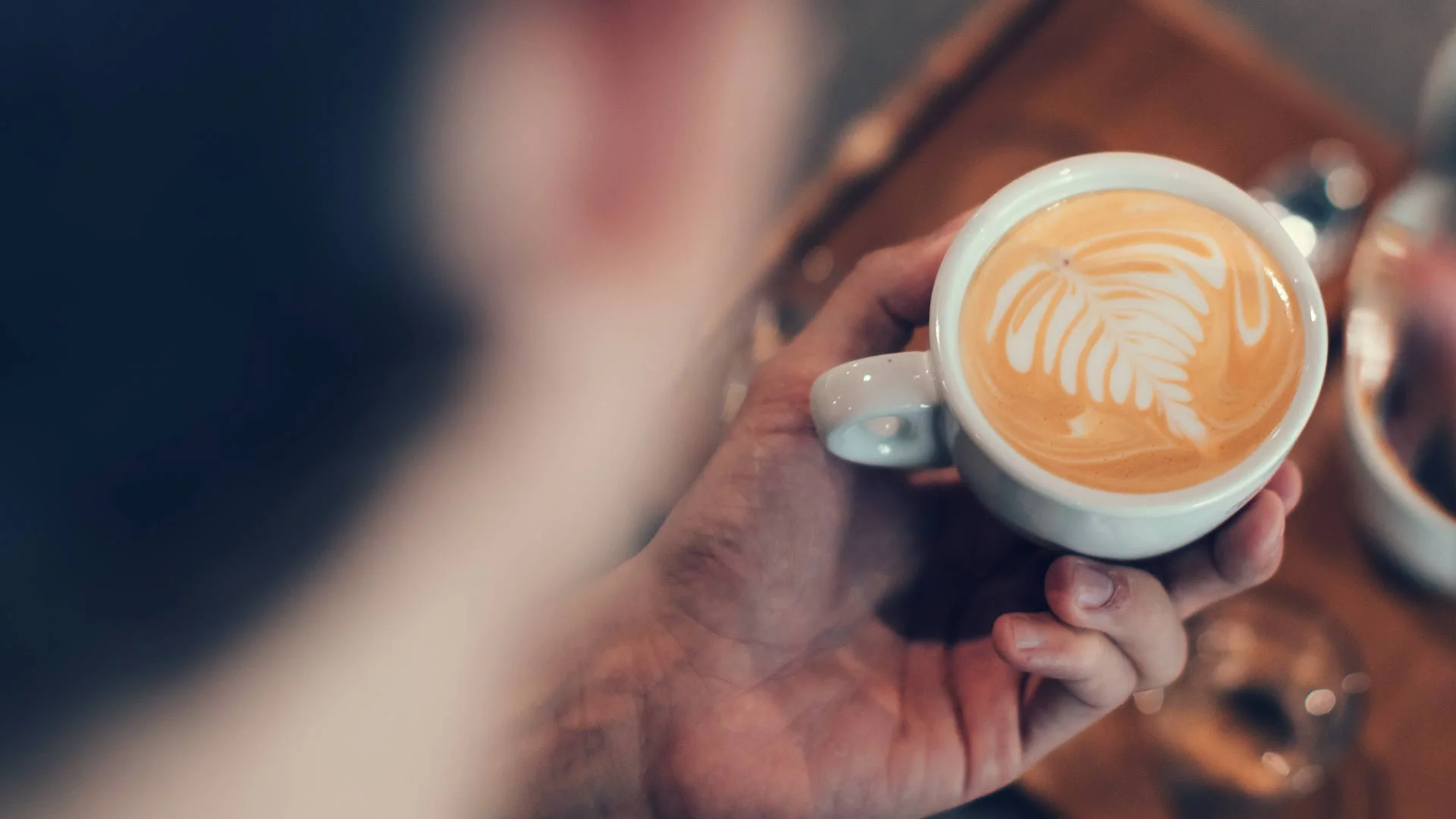 Coffee art in the shape of a plant.