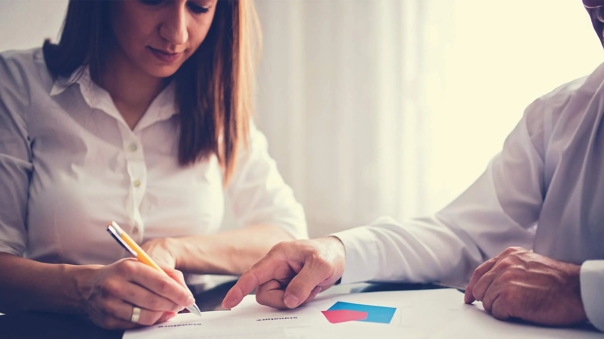 New starter signing her employment contract.