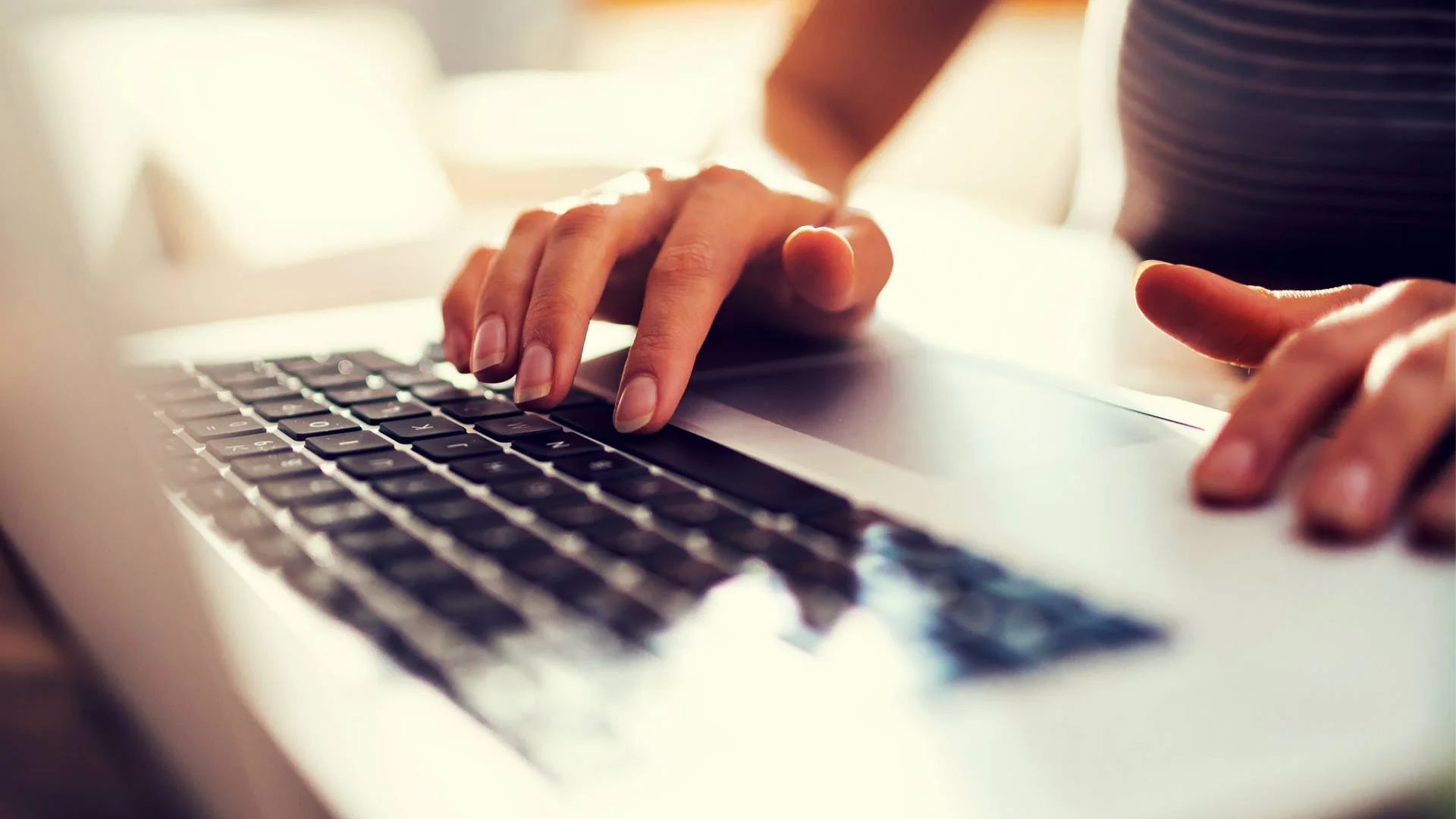 Person searching for rental properties online.