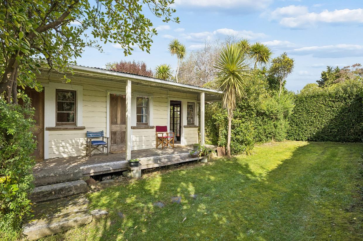 Four generations of the Campbell family have enjoyed holidays in this original crib in Warrington, north of Dunedin, first arriving by train or bus. It is listed for sale after 63 years. Photo: Nidd Realty