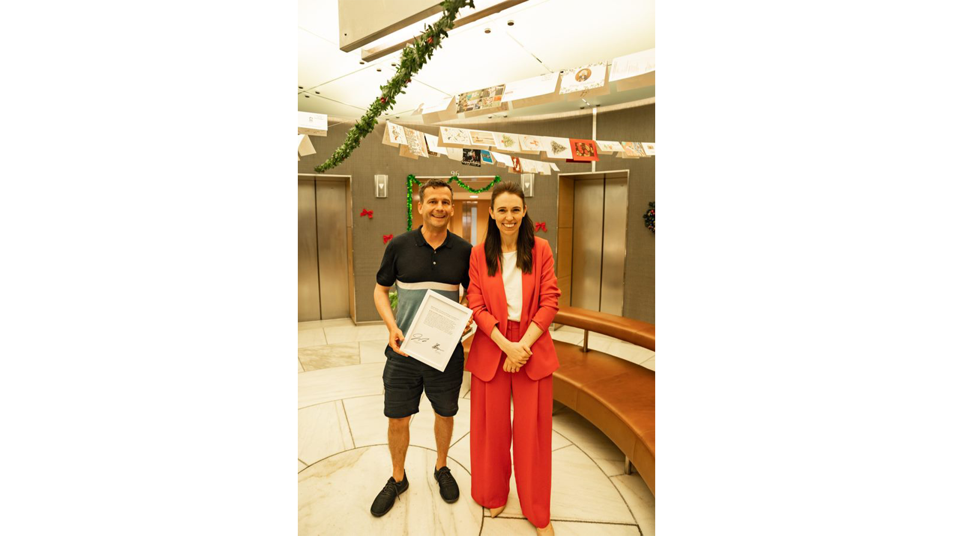 Photograph of David Seymour and Jacinda Ardern, posing with a transcribed copy of the infamous moment.