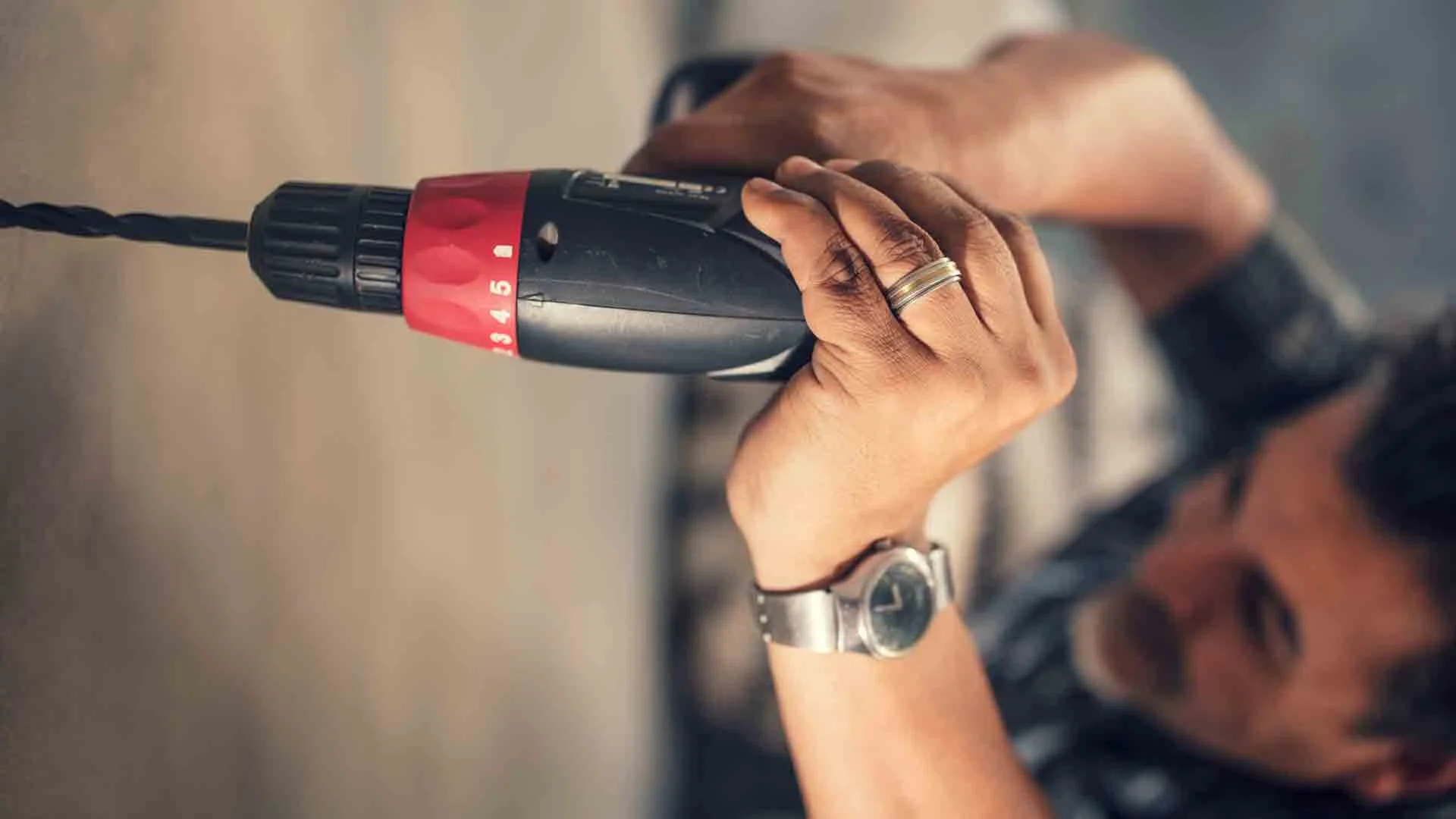 Landlord doing maintenance at rental property.