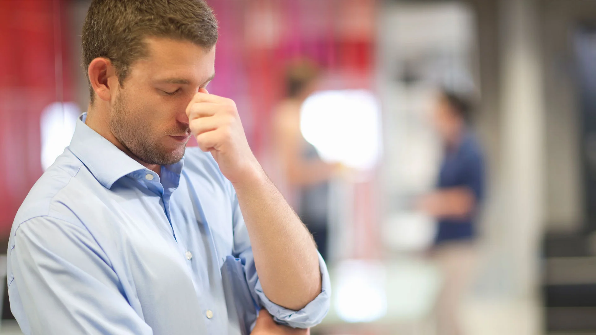 Stressed out man at work.