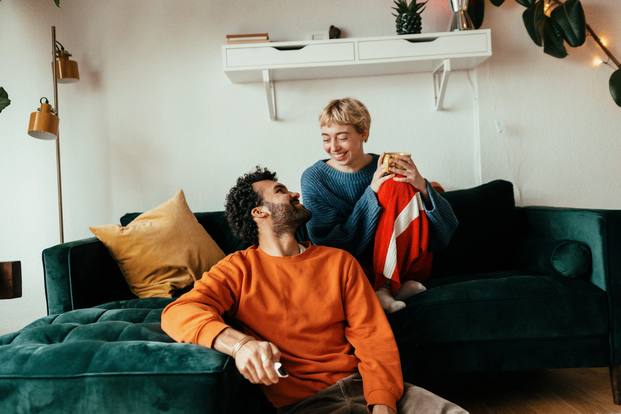 Young couple sitting on a sofa