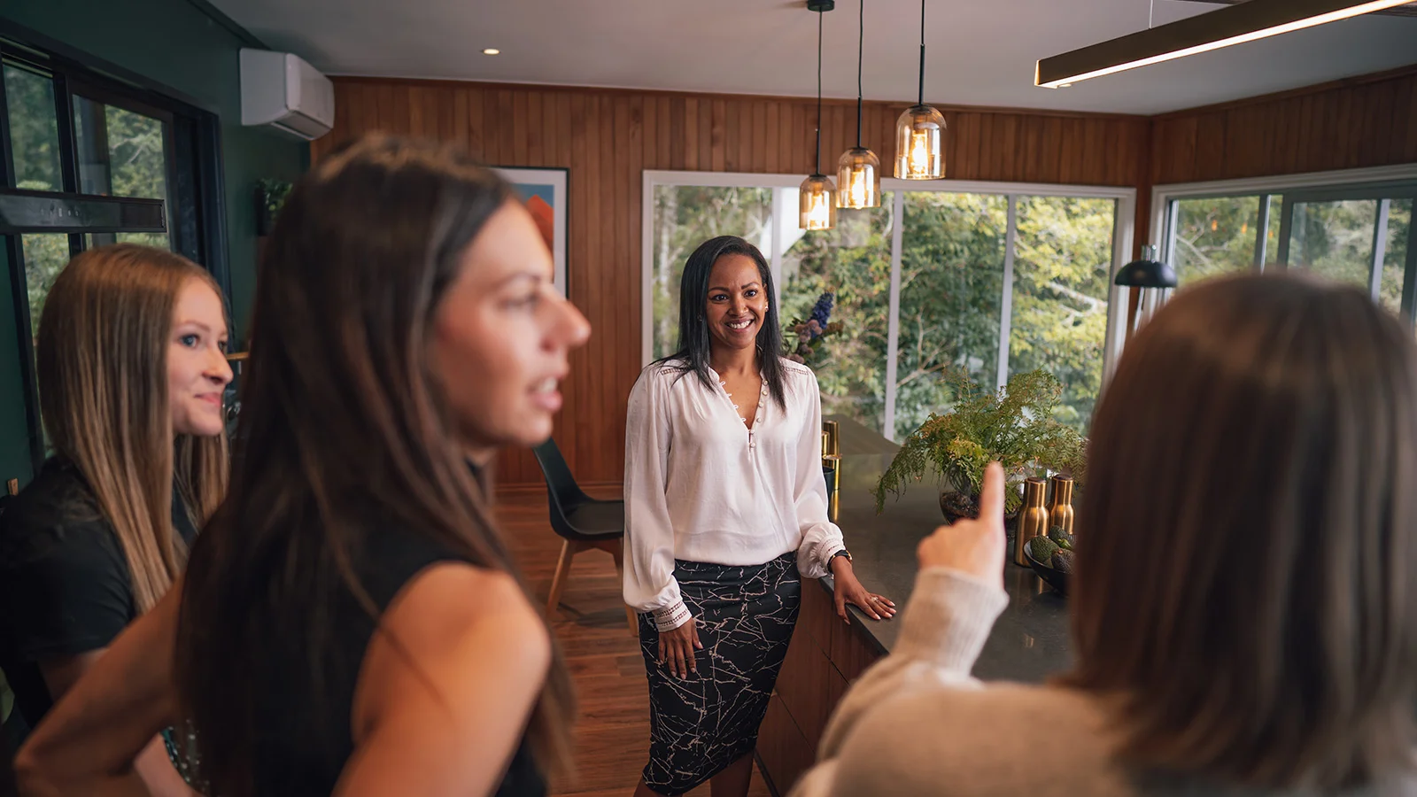 People at an open home with a real estate agent