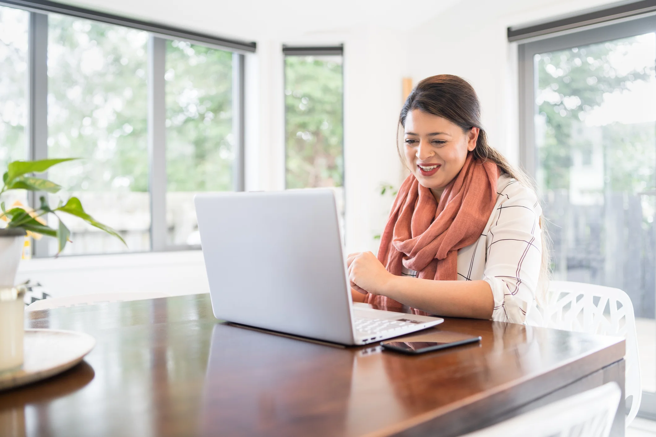 Woman working from home in Auckland, New Zealand