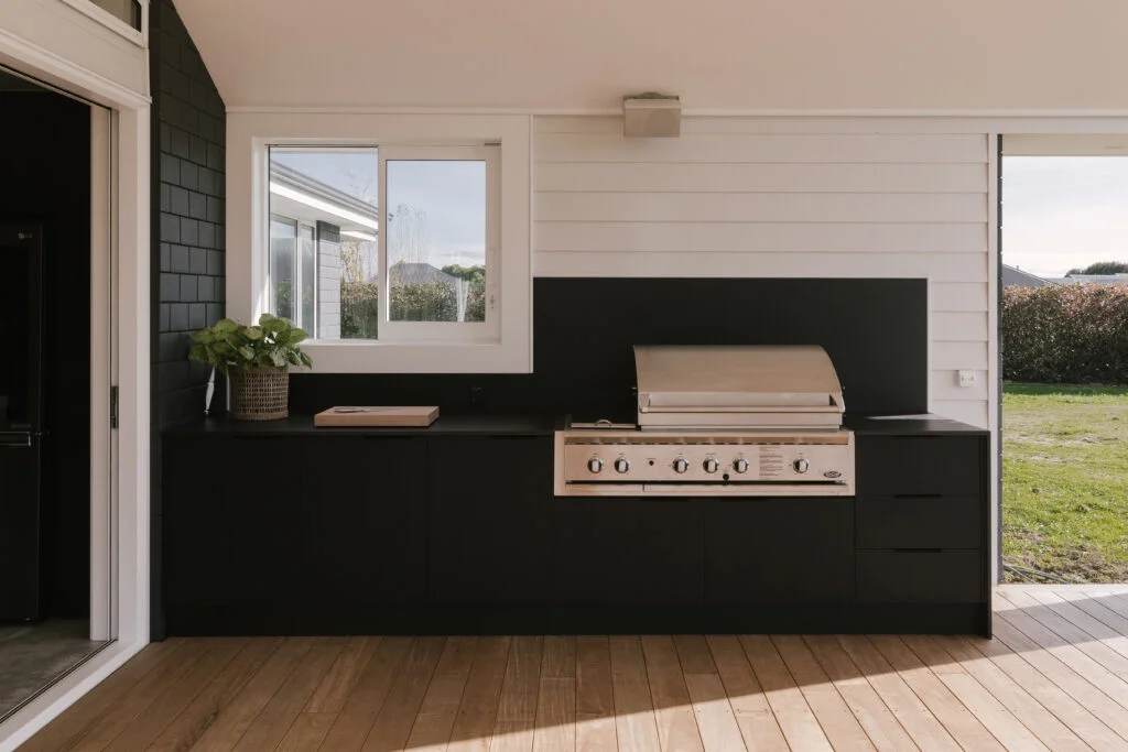 Beautiful outdoor black kitchen with BBQ