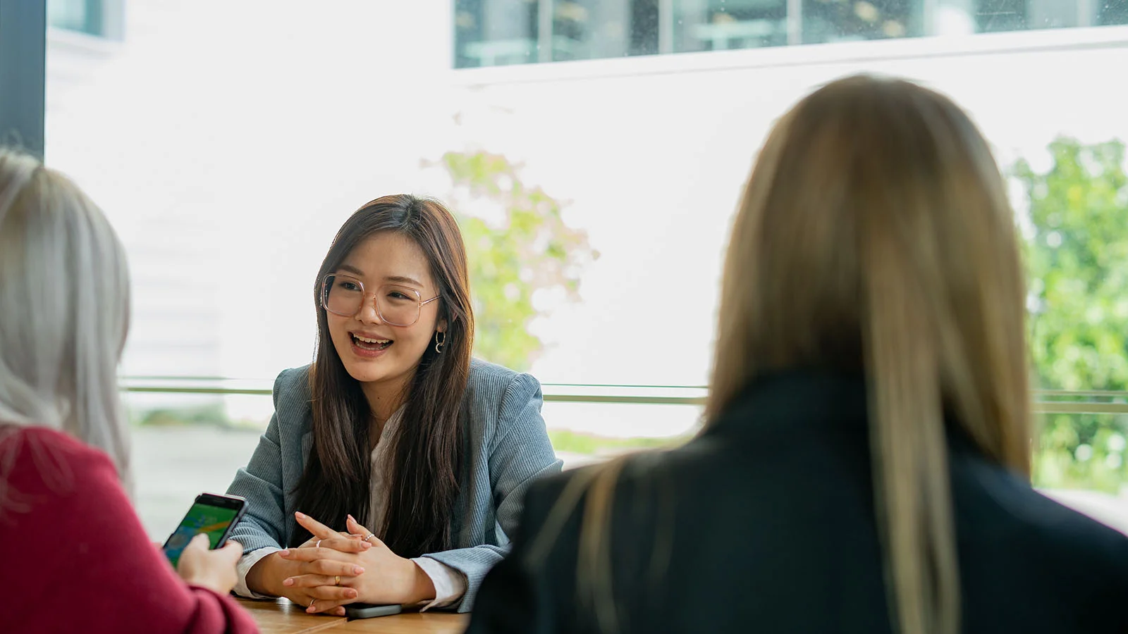Woman taking to her manager about career progression