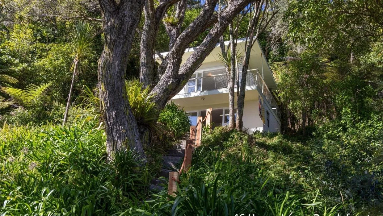 exterior of 60s Snells Beach bach