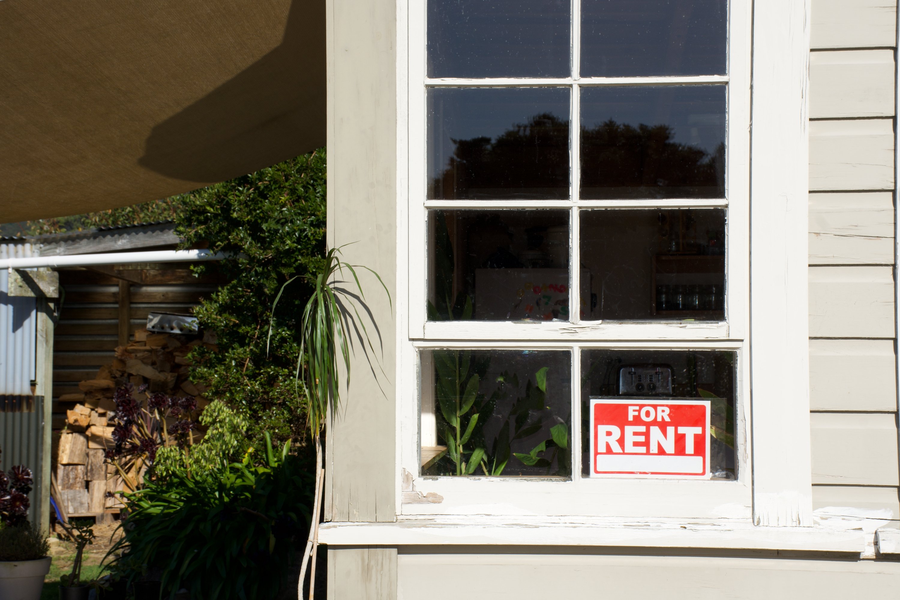 Rental sign in window 