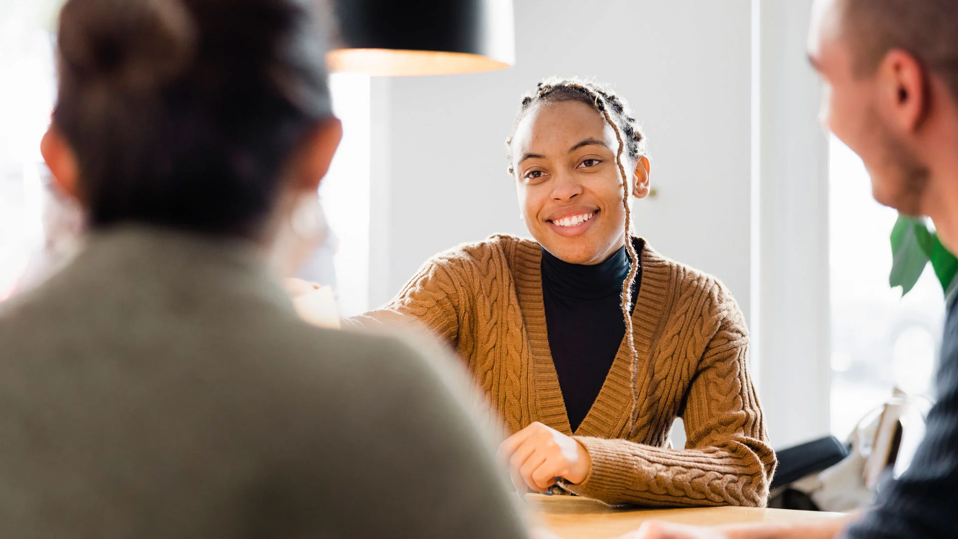 Job applicant talking to an interviewer.